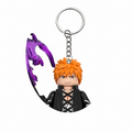 Ichigo Kurosaki character keychain with purple weapon